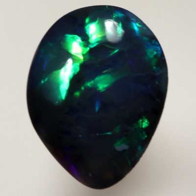 SOLID BLACK OPAL  Bright and rich rolling flashes of turquoise, green and blue